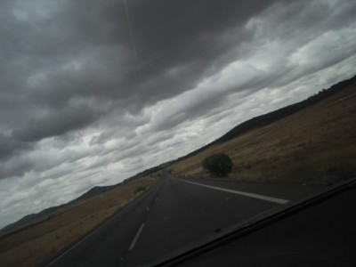 Cáceres al fondo
