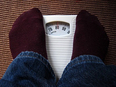 Je me pèse. Je découvre que je fais 15 kilos de plus que mon poids habituel
